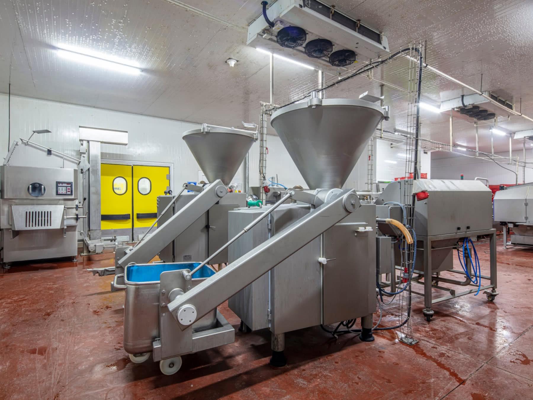 Industrial food processing machinery in a stainless-steel production line